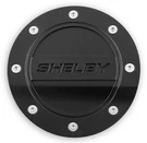 FS3Z-6640526-SA Drake Muscle Cars Black Fuel Door Shelby Logo. Fixed Price $80.45.