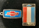 1975-77 Camero Front Nose Header Panel Emblem & Chevrolet Keychain-lot 2 (B5). Fixed Price $50.00.