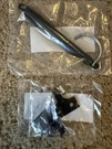 1963-1965E C2 Corvette Jack Hold Down Spring Single Hook With Brackets 3963108. Fixed Price $25.00.