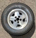 87-96 Jeep Cherokee Spare Wheel & Tire Goodyear Wrangler Radial 215/75R-15. Fixed Price $125.00.