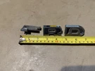 1962-64 Ford Truck Hood Letters Tabs Damaged And. Fixed Price $25.00.