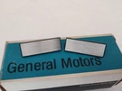 Nos 1974-78 Chevy Cadillac Olds Door Assist Strap Escutcheon Cover Pair 1653249. Fixed Price $15.00.