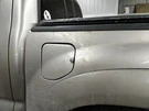 Tacoma 2006 Fuel Filler Door 1703460. Fixed Price $108.08.