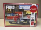 Amt 1147 Ford C600 Tilt Cab Stake Bed Truck W/2 Machines Parts Sealed 1/25 New. Fixed Price $69.99.