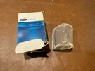 Nos Ford C9WY-15514-B Back Up Lamp Lens 1969- 1970 Mercury Cougar XR-7 Lh. Fixed Price $200.00.