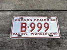 1962 Oregon Dealer License Plate Ford Dodge Chevrolet Mobar Pacific Wonderland. Fixed Price $99.00.