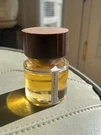 Sand + Fog Vanilla Amber Perfume Oil 1.7 Fl Oz Roll-on Applicator Wood Cap. Fixed Price $30.00.