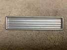 Used Ford Deluxe Custom Radio Delete Plate 5 1N Long W/o Mounting Hardware. Fixed Price $32.00.