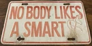 Nobody Likes Smart Novelty Booster License Plate. Fixed Price $44.99.