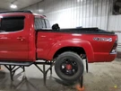 2006 Toyota Tacoma Gas Fuel Filler Door Lid Cover Red. Fixed Price $90.00.