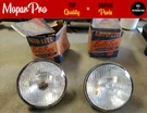 Pair Nos 12 Volt Auto-lite Bull's Eye Mopar Imperial Chrysler Plymouth Headlight. Fixed Price $795.00.
