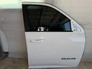 21 Dodge Ram Door Front Right Crew Cab White Bighorn *damage*. Fixed Price $500.00.