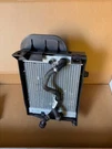 2009-2013 Bmw X5 E70 Left Driver Auxiliary Radiator W/ Air Duct Oem 51747222869. Fixed Price $599.99.