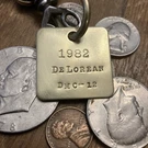 1982 De Lorean DMC-12 Brass Key Fob. Fixed Price $16.95.