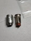 1970 - 1979 Corvette Casco Gm Nos Cigarette Lighter Housing & Retainer 3986869. Fixed Price $100.00.
