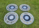 Set Of 1958 Lincoln Premier Accessory 14" Wheel Covers Gold Accents Hubcaps. Fixed Price $629.00.