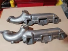 Oldsmobile V8 Exhaust Manifolds - Two Right Side. Fixed Price $175.00.