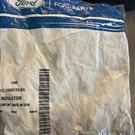 Genuine Ford Center Insulator F81Z-1000155-BA. Fixed Price $9.60.