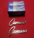 Two Nos 1968 - 69 Chevrolet Front Fender "camaro" Script Emblems 3916660. Fixed Price $160.00.