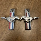 Preowned 68 Mustang 289 Fender Emblems C8ZZ-16228-A Pair #1. Fixed Price $50.00.