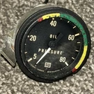 Stewart Warner 82322 2-1/16 Mech Oil Pressure Gauge, 5-80 Psi (as Removed). Fixed Price $40.00.