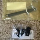 1965L-1982 C2 Corvette Jack Hold Down Spring Double Hook With Brackets & Rivets. Fixed Price $25.00.