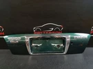 00-01 Mazda 626 Center Tail Finish Trim Panel Moulding Green Paint Code 11J. Fixed Price $135.00.