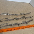 Lot 3 Vtg 1966 1967 Ford Country Squire Quarter Panel Emblem Car Logo Part. Fixed Price $234.00.