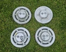Set Of 4 1959-1960 Chevy Bel Air Impala Dog Dish Biscayne. Fixed Price $199.00.
