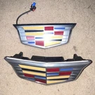 Gm Oem New Car Take Off 2025 Cadillac Escalade Front & Rear Crest Emblem Sets. Fixed Price $150.00.