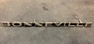 Vintage 1966 Pontiac Bonneville Grill Emblem P/n 9775153 Rare. Fixed Price $245.00.