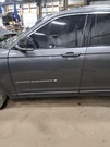 2023 Grand Cherokee Left Driver Side Front Door Assembly Color: Gray Pas. Fixed Price $1770.00.