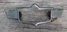 1949 Desoto Hood Emblem Bezel Only 1254985. Fixed Price $59.99.